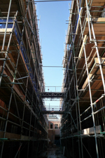 Scaffolding in narrow alleyway